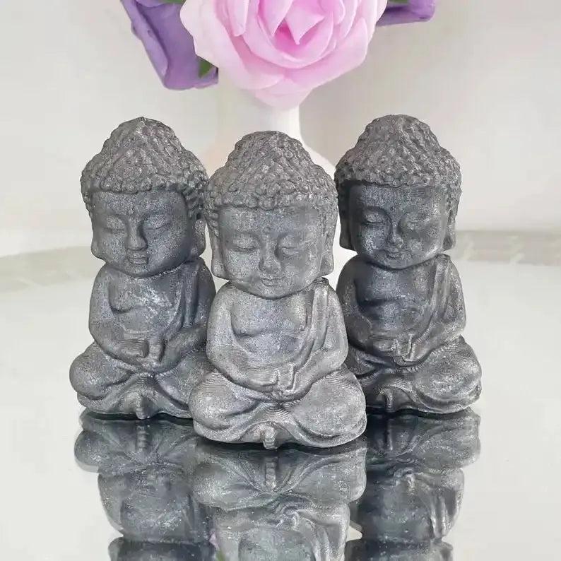 80mm seated Shungite Buddha carving in matte black, perfect for Root Chakra grounding and peaceful meditation.