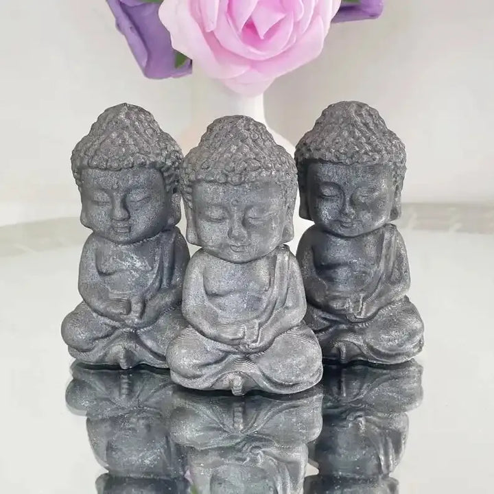 80mm seated Shungite Buddha carving in matte black, perfect for Root Chakra grounding and peaceful meditation.