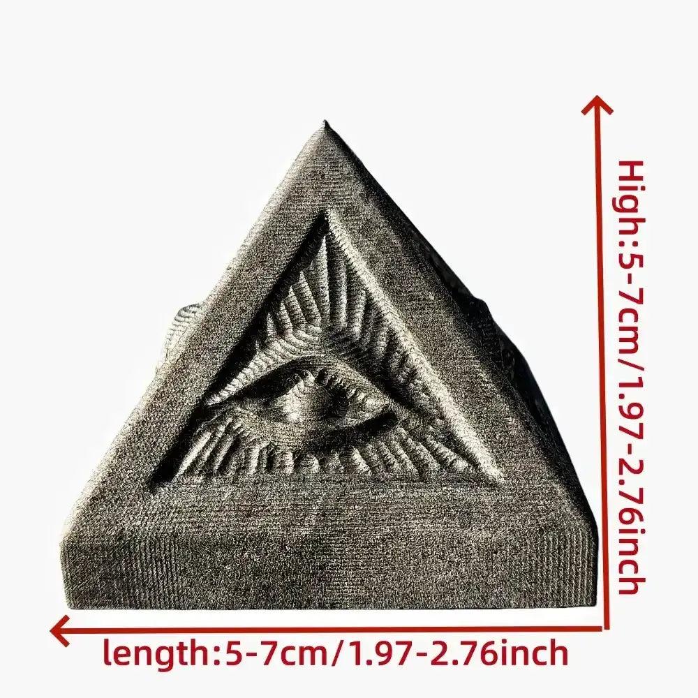Hand-polished satin black Shungite pyramid featuring an engraved Eye of Providence for grounding and protection.