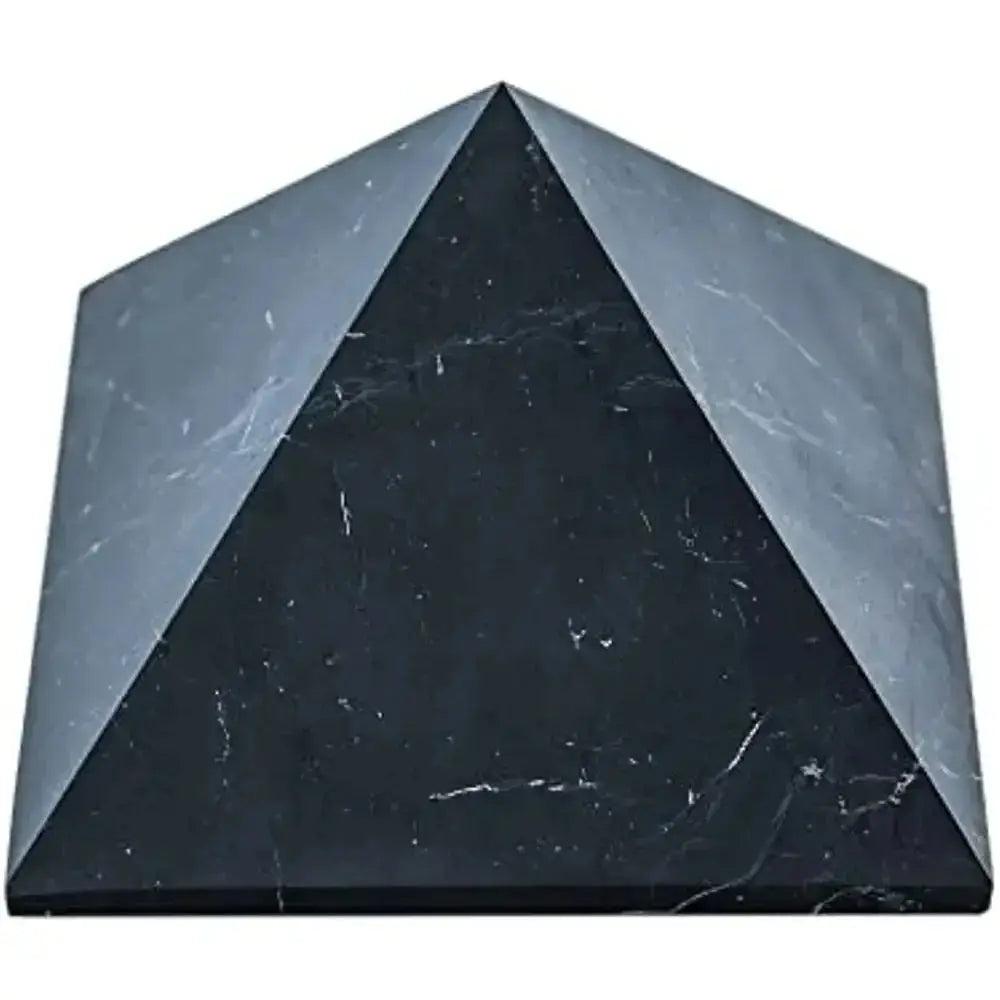 Polished black shungite pyramid from Crystal Destiny, showing subtle white veining, for EMF protection.
