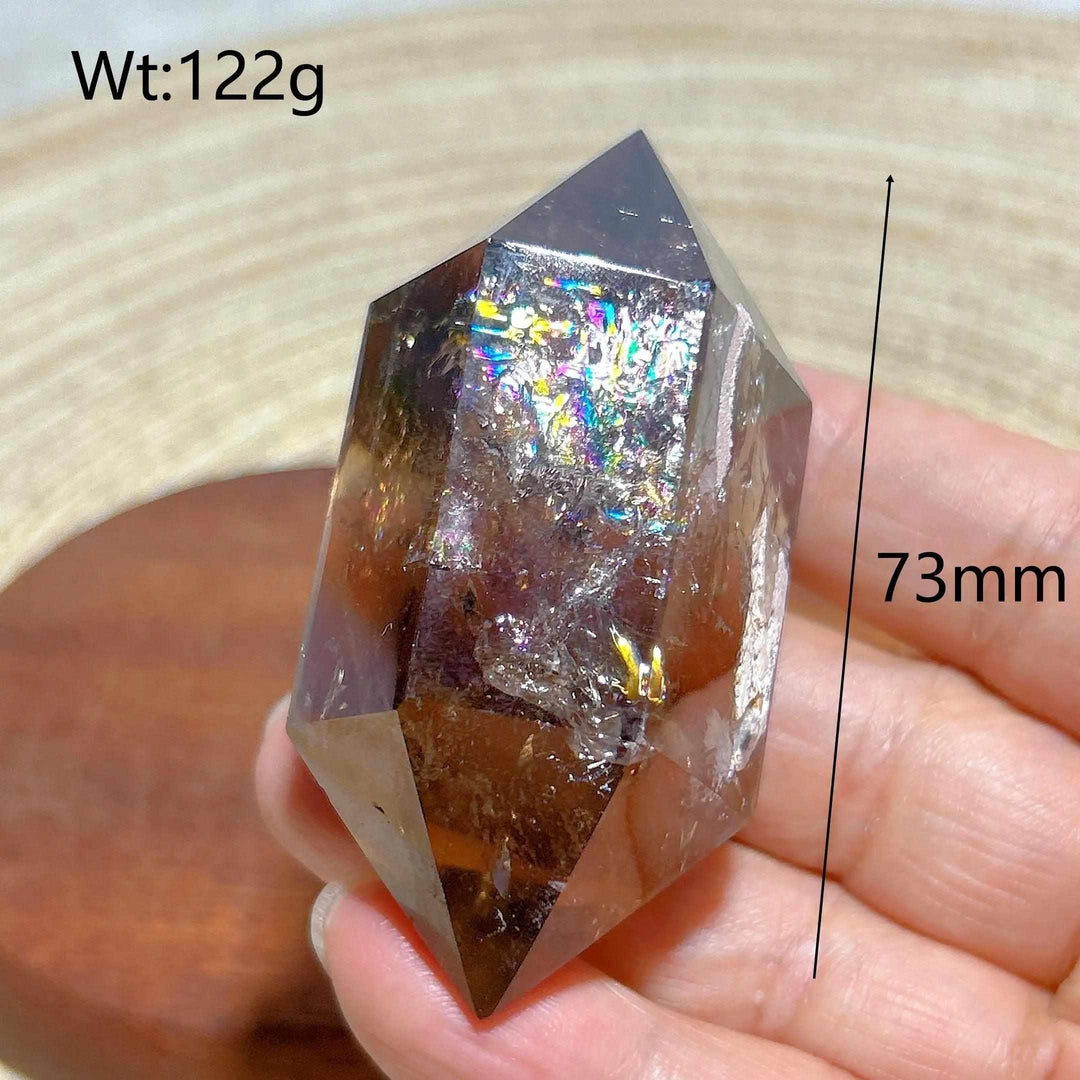 Smoky quartz double point crystal tower featuring vibrant rainbow inclusions, 73mm tall, perfect for energy meditation.
