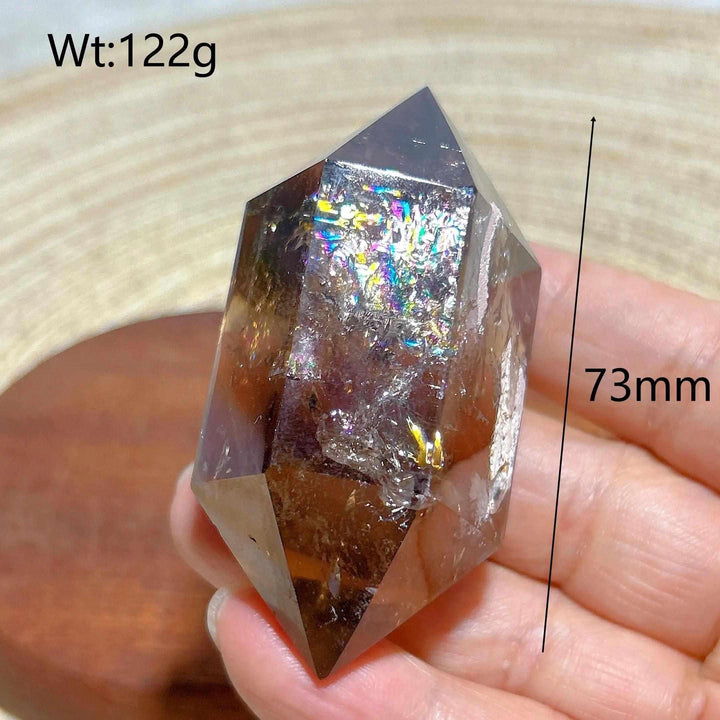 Smoky quartz double point crystal tower featuring vibrant rainbow inclusions, 73mm tall, perfect for energy meditation.