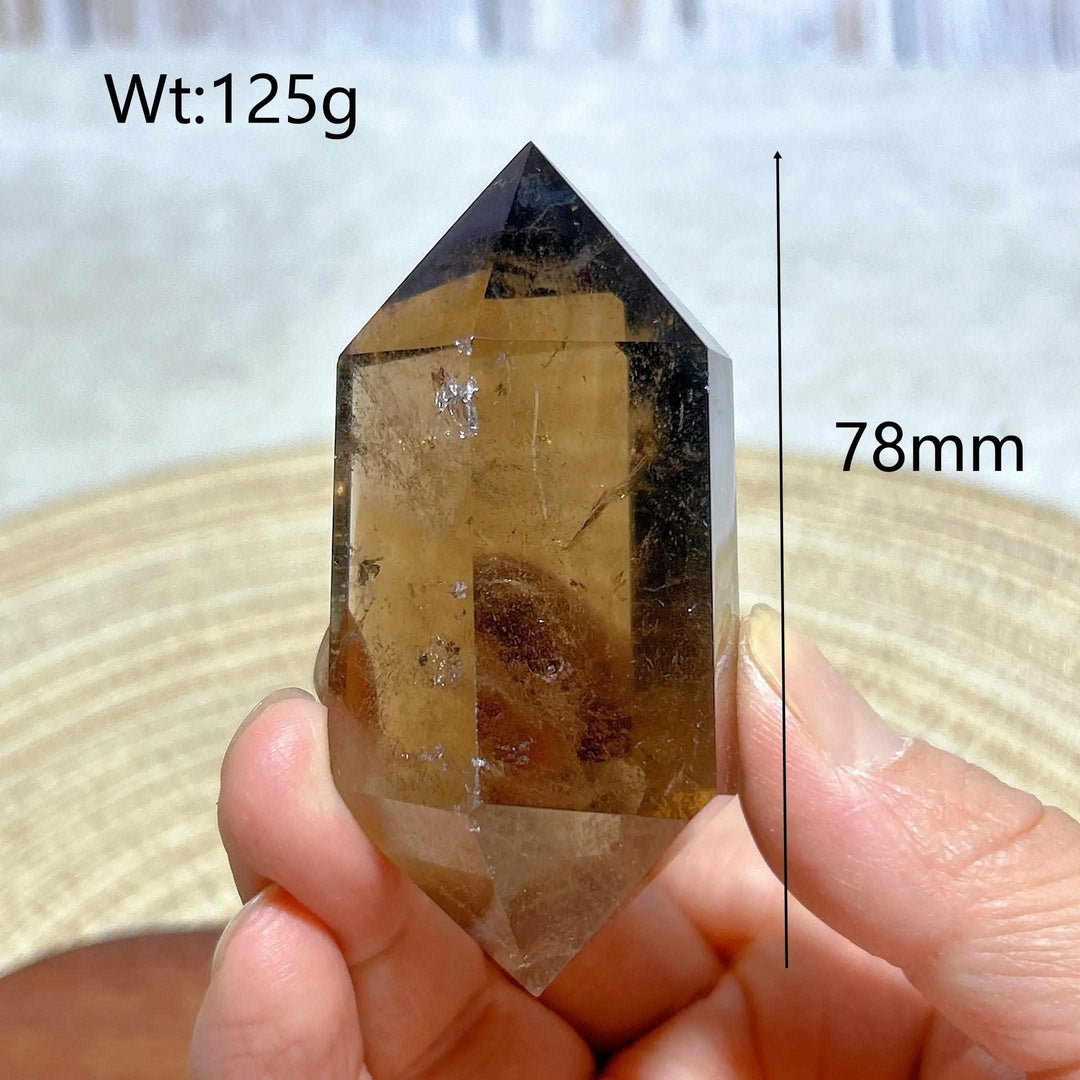 125g double point smoky quartz crystal tower featuring natural rainbow inclusions for meditation and energy work.