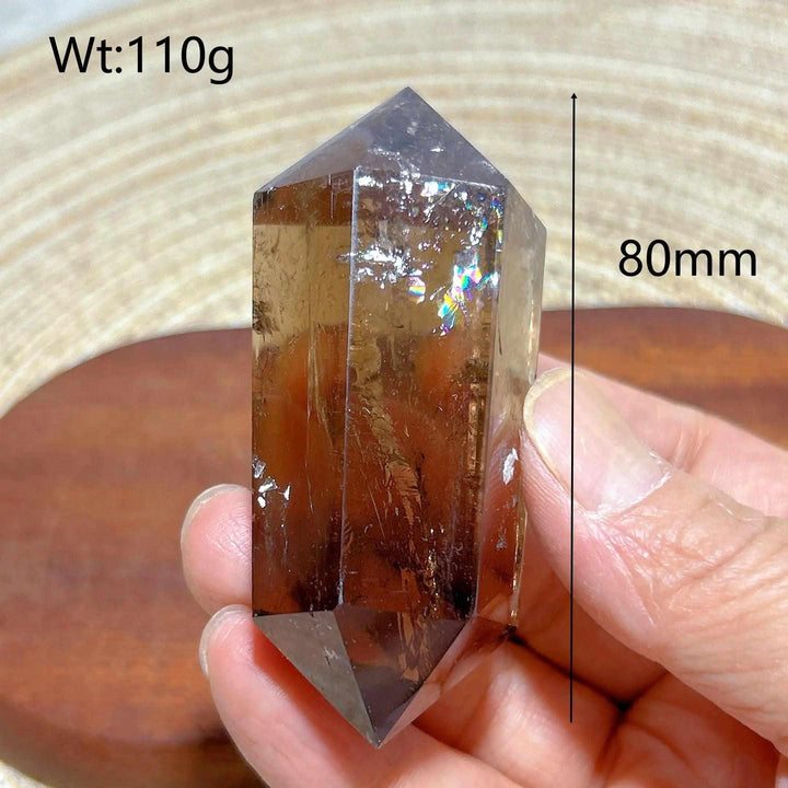 80mm smoky quartz double point crystal with natural rainbow inclusions, perfect for meditation and energy work.
