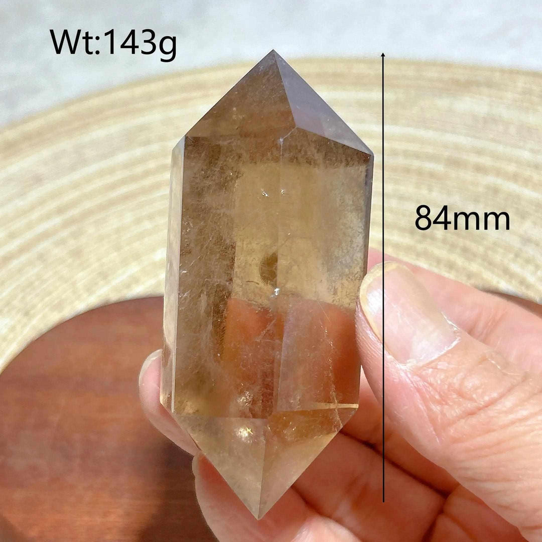 84mm Smoky Quartz double point crystal with natural rainbow inclusions, perfect for meditation and energy grounding.