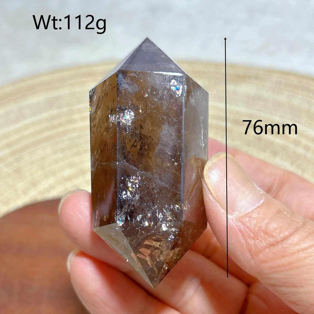 Smoky quartz double point crystal tower featuring natural rainbow inclusions, 76mm tall, perfect for energy meditation.