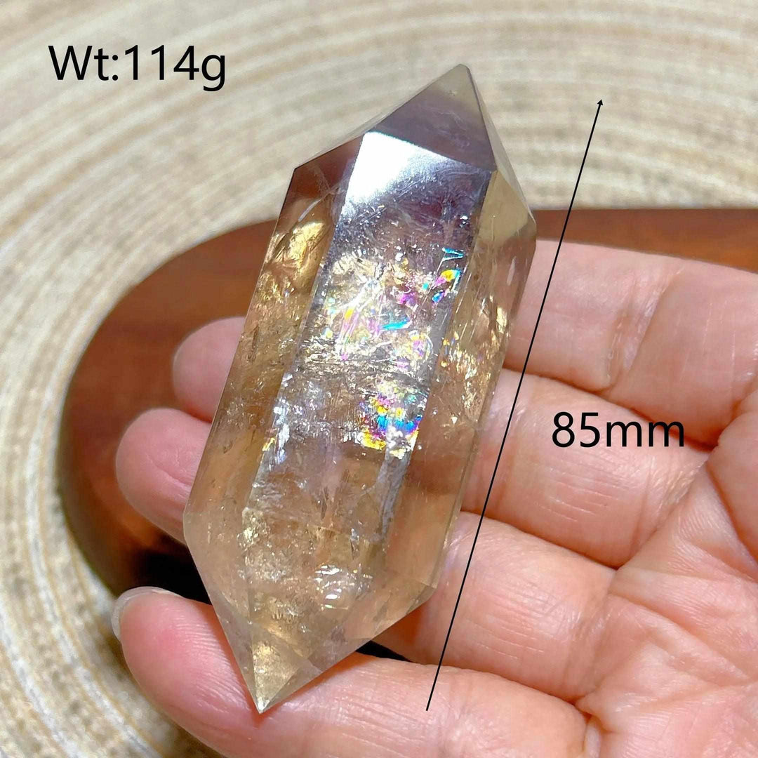 85mm smoky quartz double point crystal featuring natural rainbow flash inclusions for meditation and energy work.