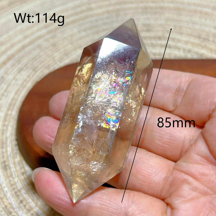 85mm smoky quartz double point crystal featuring natural rainbow flash inclusions for meditation and energy work.