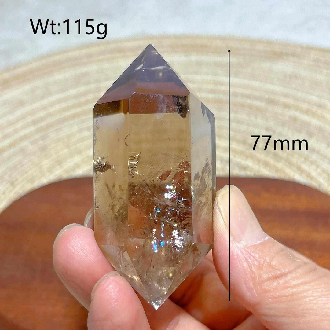 Smoky Quartz double point crystal tower with natural rainbow inclusions, 77mm tall, 115g, for meditation and energy work.