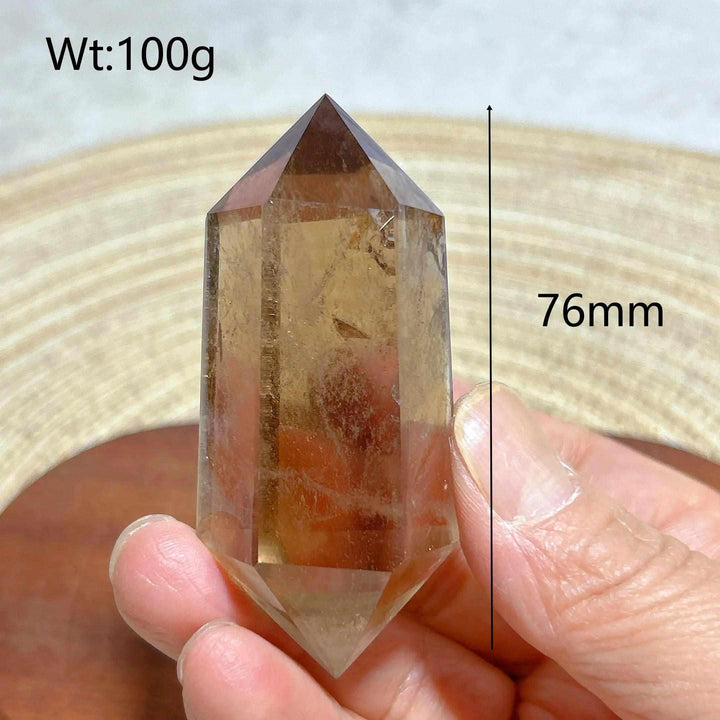 100g Smoky Quartz double point crystal tower with natural rainbow inclusions, 76mm tall for meditation and energy work.