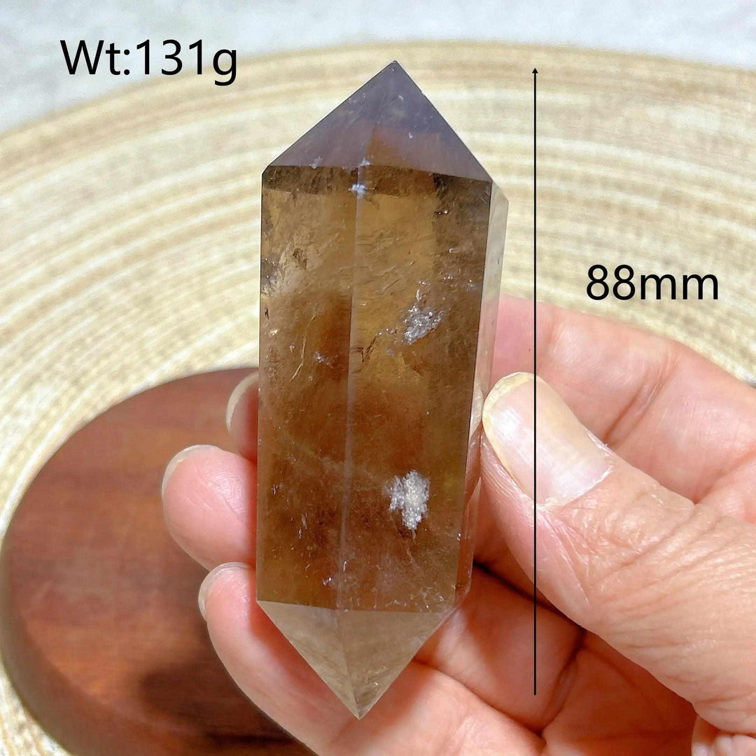 88mm smoky quartz double point crystal tower with natural rainbow inclusions, perfect for meditation and energy work.