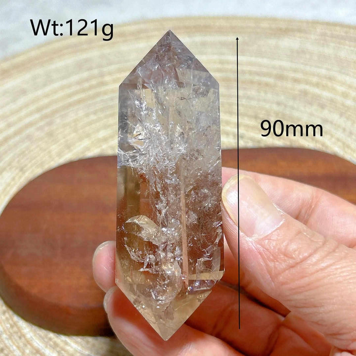 121g Smoky Quartz double point crystal tower featuring natural rainbow inclusions and a clear, terminated design.