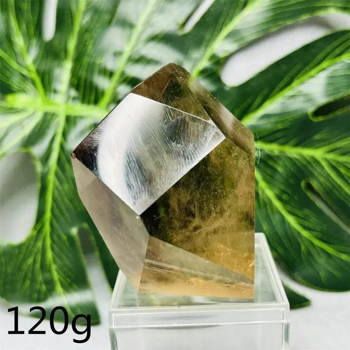 Hand-polished smoky quartz free-form crystal tower from Crystal Destiny, showing deep brown hues and natural inclusions.