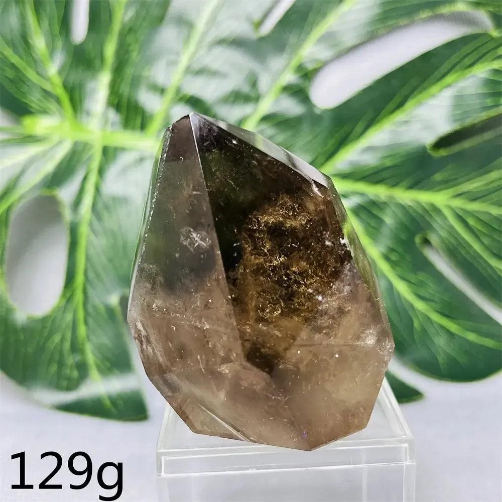 Hand-polished Smoky Quartz free-form crystal from Crystal Destiny, showcasing deep brown hues and natural inclusions.
