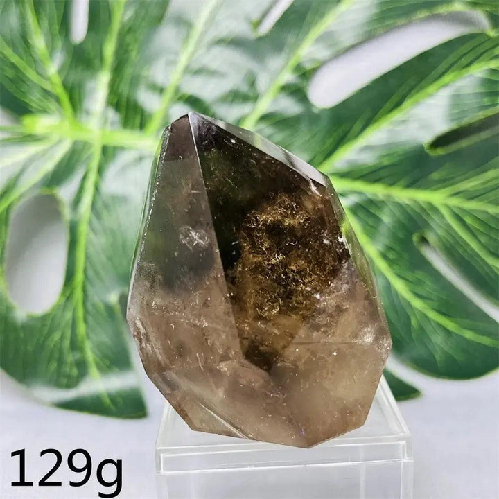 Hand-polished Smoky Quartz free-form crystal from Crystal Destiny, showcasing deep brown hues and natural inclusions.