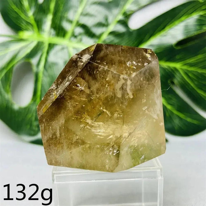 Hand-polished smoky quartz free-form crystal from Crystal Destiny, showing its natural brown-to-charcoal color.