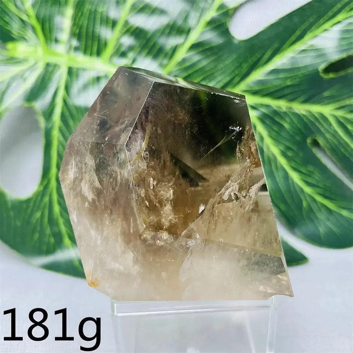 181g hand-polished Smoky Quartz free-form crystal tower from Crystal Destiny, showcasing its smoky brown-to-charcoal color.