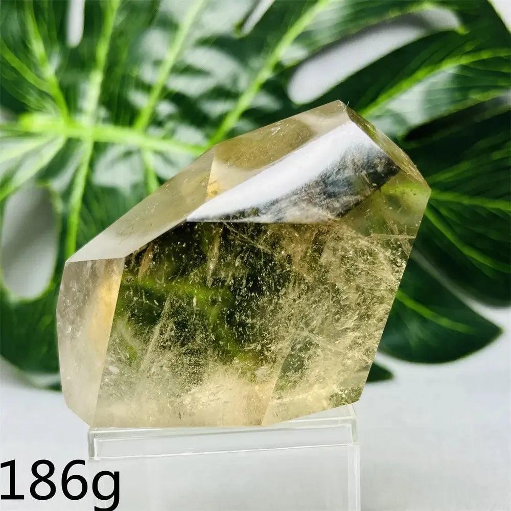 Hand-polished Smoky Quartz free-form crystal from Crystal Destiny, showcasing its natural smoky brown hue and unique facets.