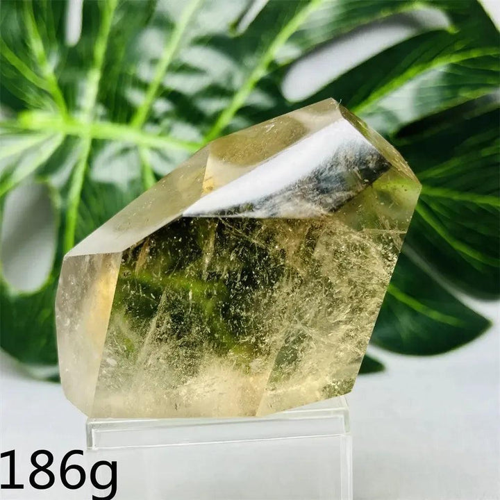 Hand-polished Smoky Quartz free-form crystal from Crystal Destiny, showcasing its natural smoky brown hue and unique facets.