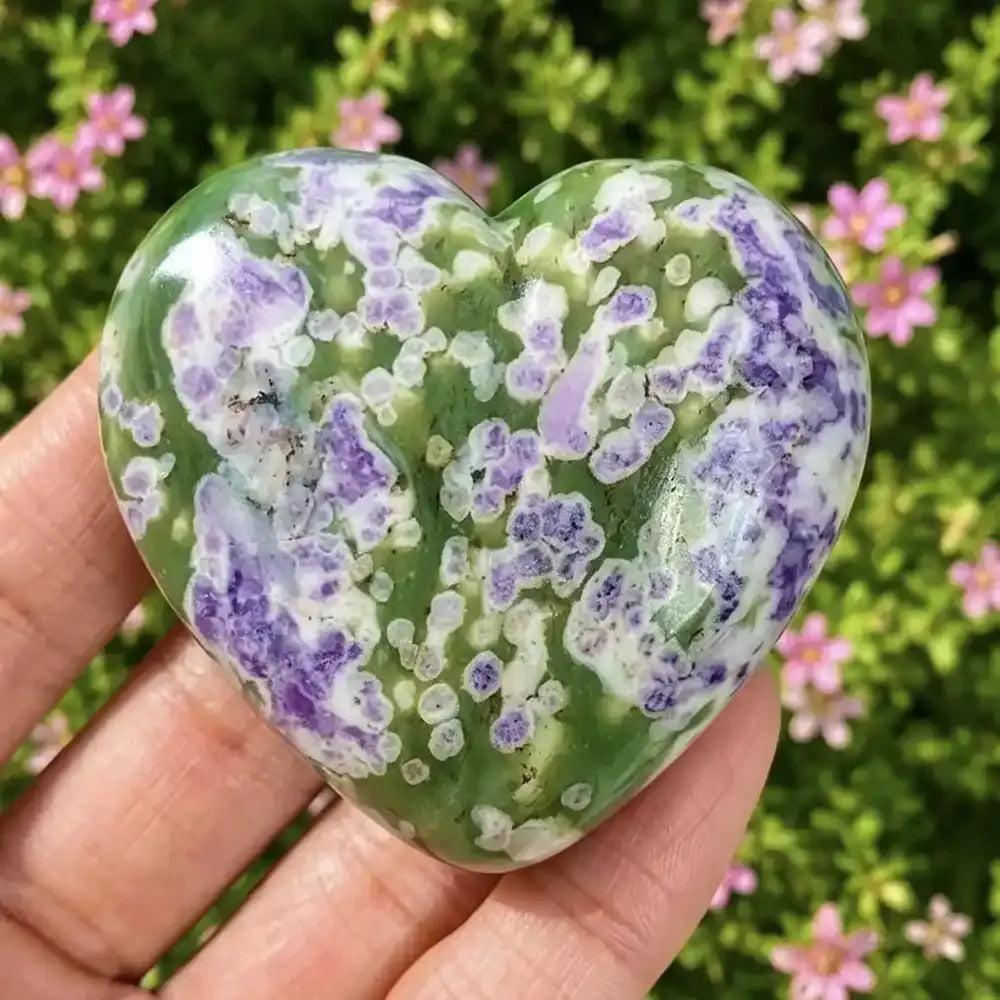 Polished natural Snowflake Jade heart carving with vibrant green and purple patterns, perfect for healing and home decor.