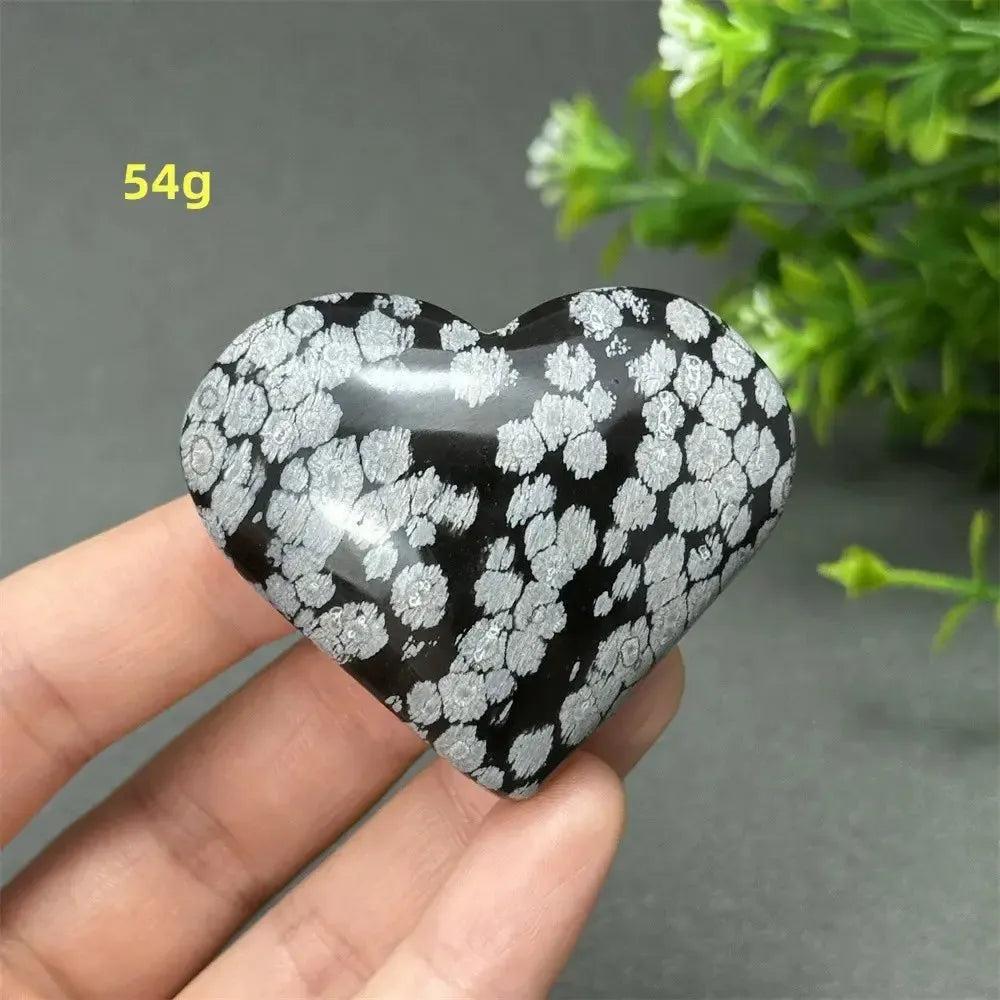Polished Snowflake Obsidian Crystal Heart, 54g, showcasing black volcanic glass with white snowflake patterns.