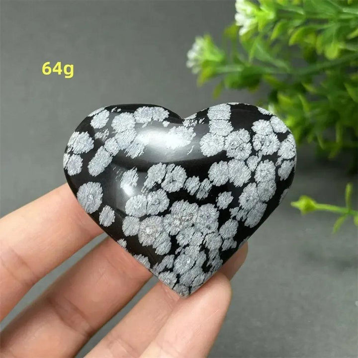 Polished Snowflake Obsidian Crystal Heart, 64g, showcasing unique black volcanic glass with white snowflake patterns.