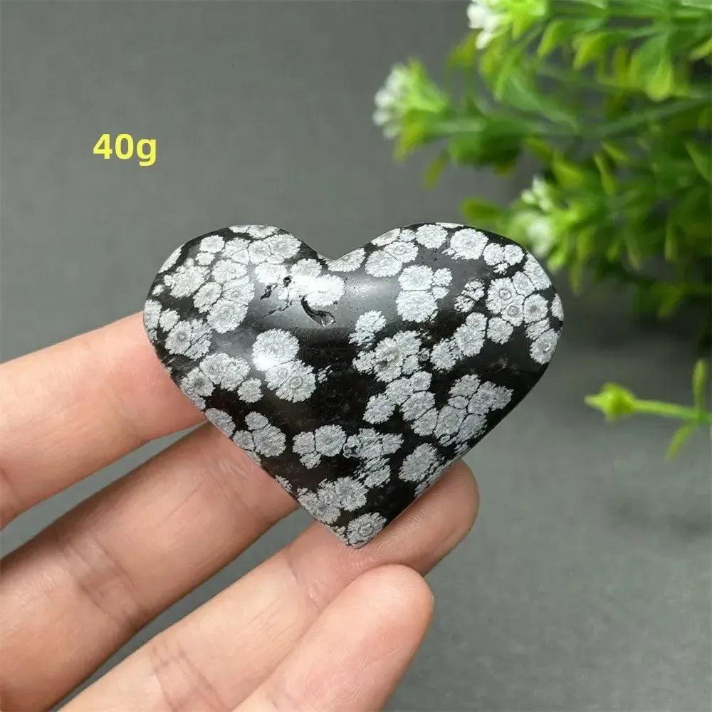 Polished 40g Snowflake Obsidian Crystal Heart, black with white snowflake patterns, for grounding and transformation.