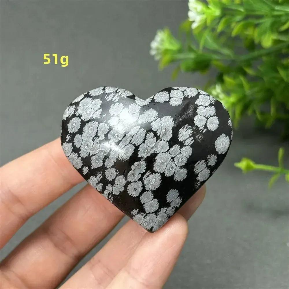 Polished Snowflake Obsidian Crystal Heart, 51g, showcasing black volcanic glass with white snowflake patterns.