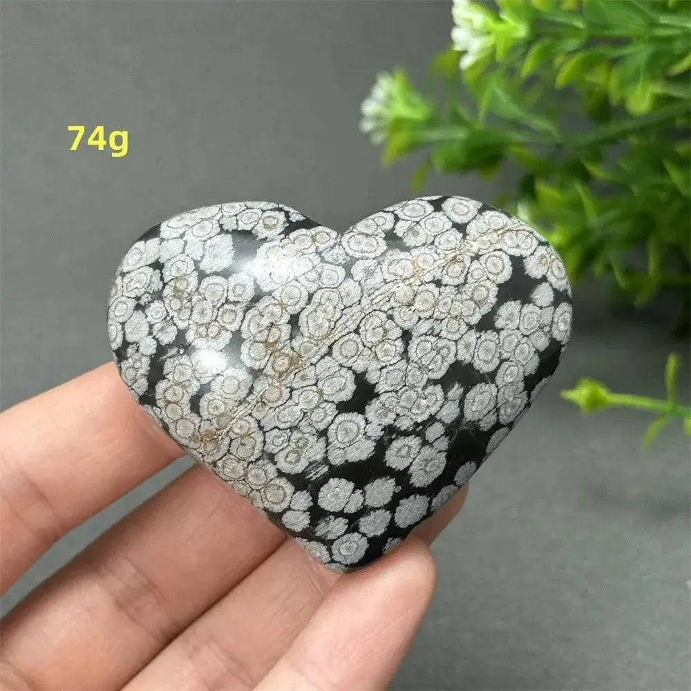 Polished Snowflake Obsidian crystal heart, 74g, with distinctive black volcanic glass and white snowflake patterns.