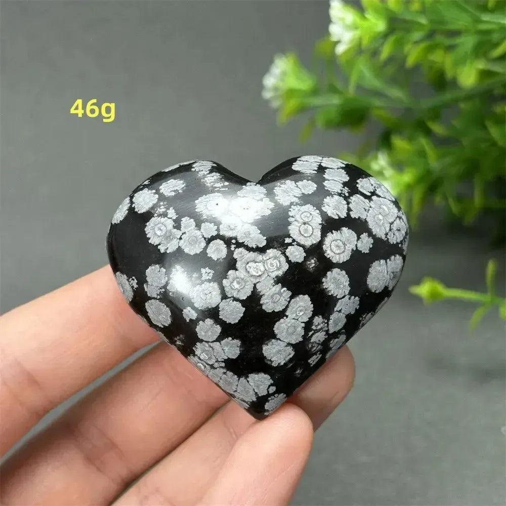 Polished Snowflake Obsidian Crystal Heart, 46g, black volcanic glass with white snowflake patterns for emotional balance.
