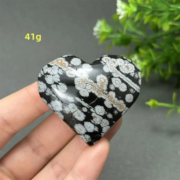 Polished Snowflake Obsidian Crystal Heart (41g) with unique white snowflake patterns, symbolizing transformation and healing.
