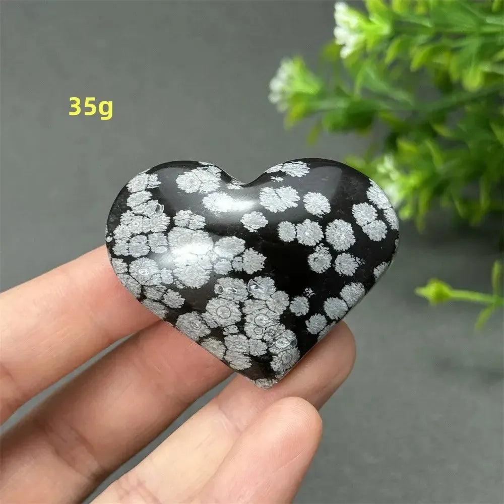 Polished Snowflake Obsidian Crystal Heart (35g) with unique white snowflake patterns, symbolizing transformation and healing.