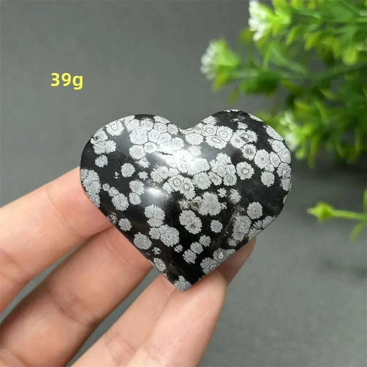 Polished Snowflake Obsidian Crystal Heart, 39g, with distinctive black volcanic glass and white snowflake patterns.