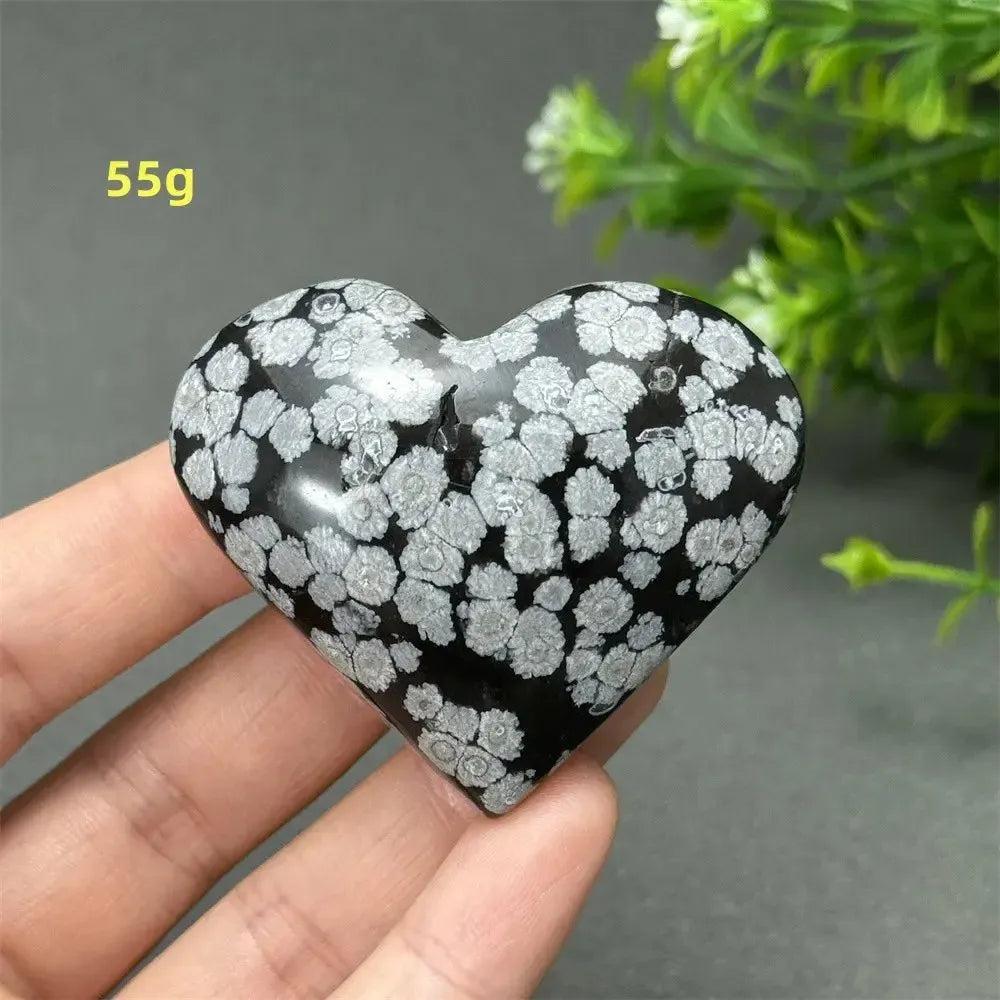 Polished 55g Snowflake Obsidian Crystal Heart, black with white snowflake patterns, for grounding and transformation.