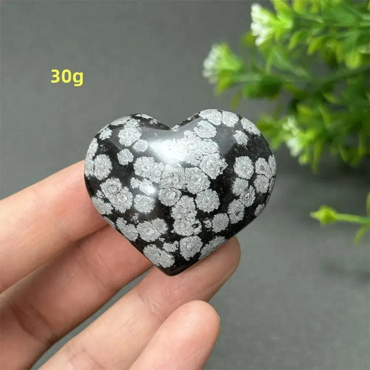 Polished Snowflake Obsidian Crystal Heart, 30g, showcasing black volcanic glass with white snowflake patterns.