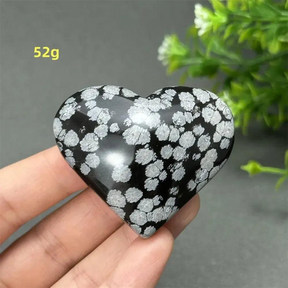 Polished Snowflake Obsidian Crystal Heart, 52g, featuring black volcanic glass with white snowflake patterns for emotional balance.