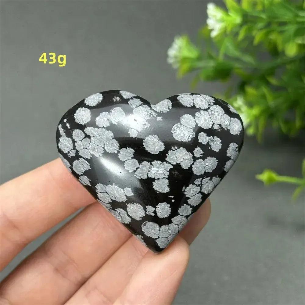 Polished Snowflake Obsidian Crystal Heart, 43g, featuring black volcanic glass with white snowflake patterns.