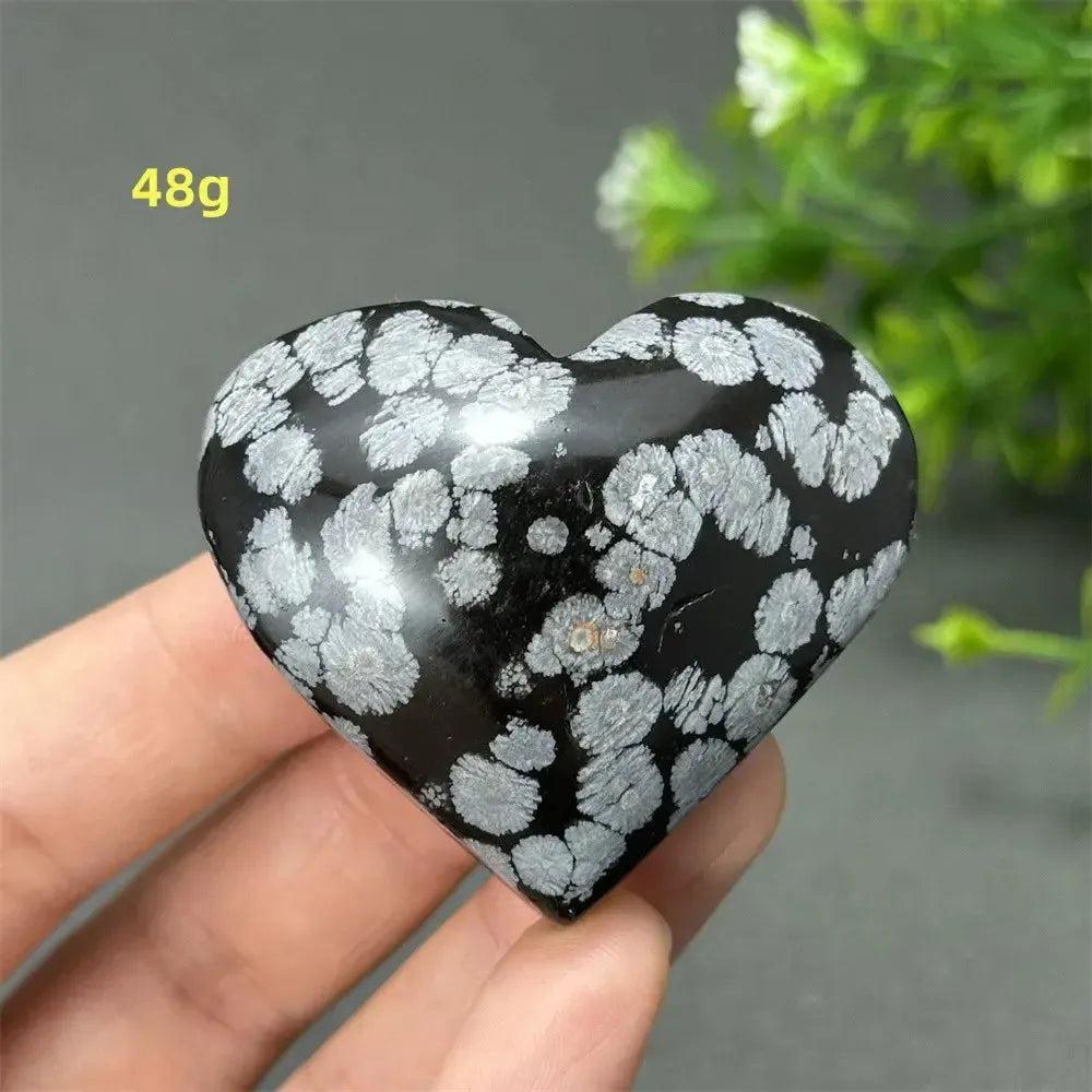 Polished Snowflake Obsidian Crystal Heart, 48g, showcasing black volcanic glass with white snowflake patterns.