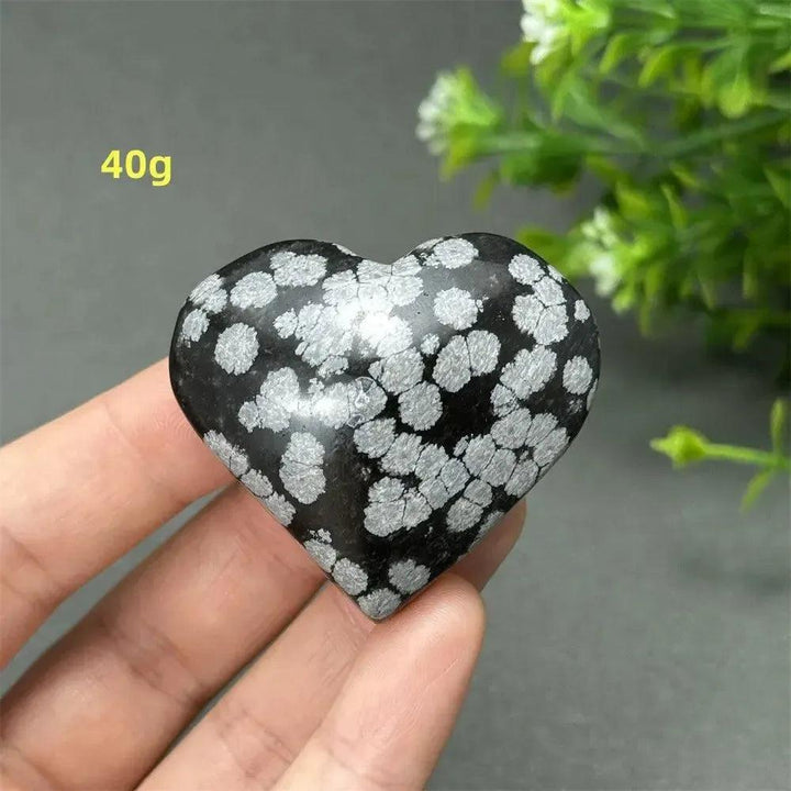 Polished Snowflake Obsidian Crystal Heart, 40g, showcasing black volcanic glass with white snowflake patterns.