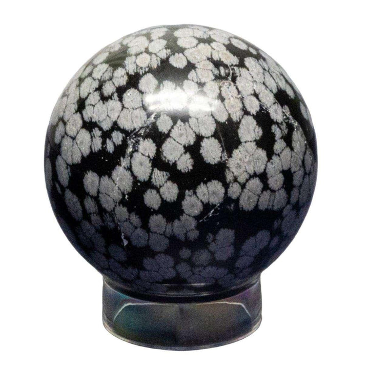 Snowflake Obsidian Sphere 50-52mm: Polished black volcanic glass with distinctive white snowflake patterns.
