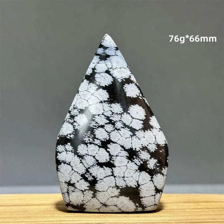 Snowflake Obsidian freeform torch from Crystal Destiny, a black crystal with white snowflake patterns, 76g, 66mm.