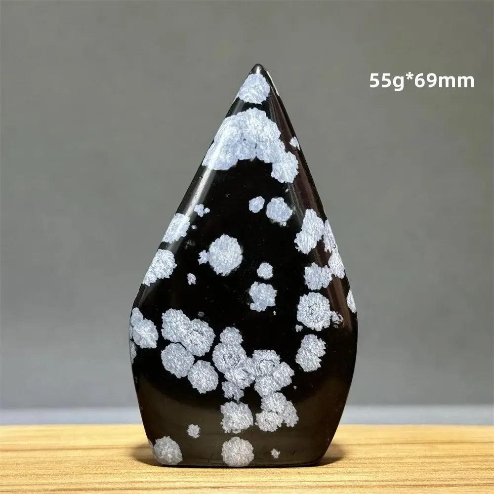 Snowflake Obsidian freeform torch from Crystal Destiny, 55g*69mm, with white snowflake patterns on glassy black.