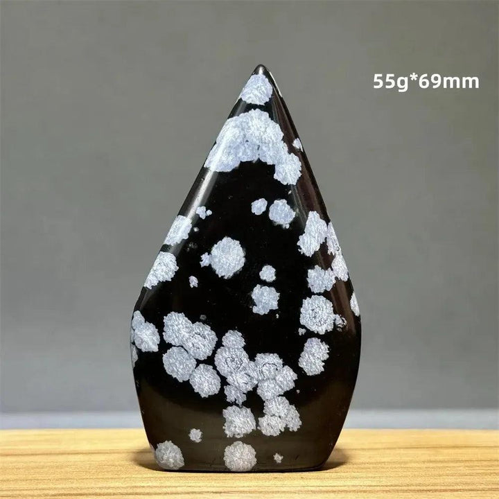 Snowflake Obsidian freeform torch from Crystal Destiny, 55g*69mm, with white snowflake patterns on glassy black.