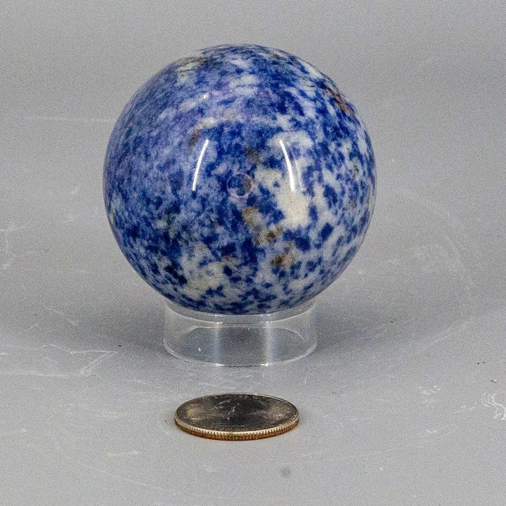 Sodalite Sphere 56mm: Deep blue crystal with white calcite veining, a well-proportioned display piece.