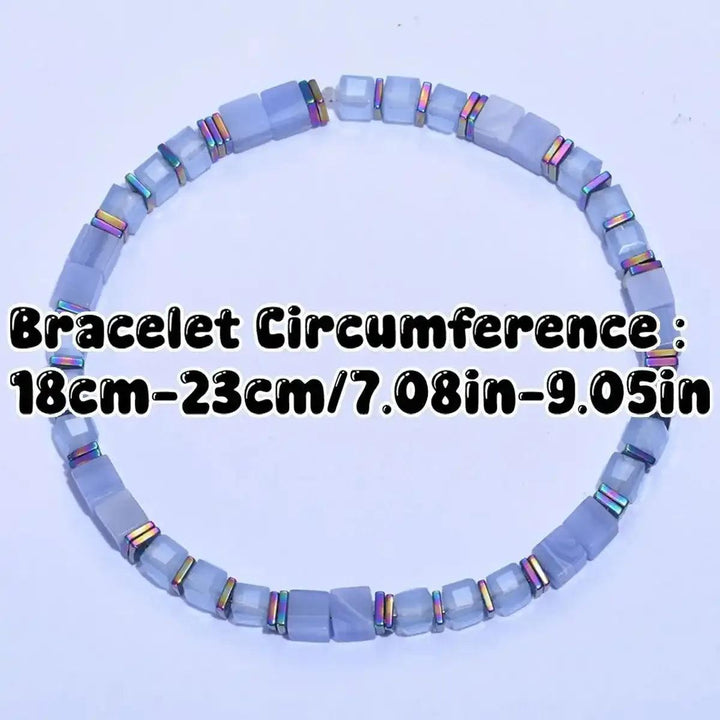 Sodalite cube bead bracelet with iridescent copper spacers for throat chakra clarity, sized 18-23cm for a perfect fit.