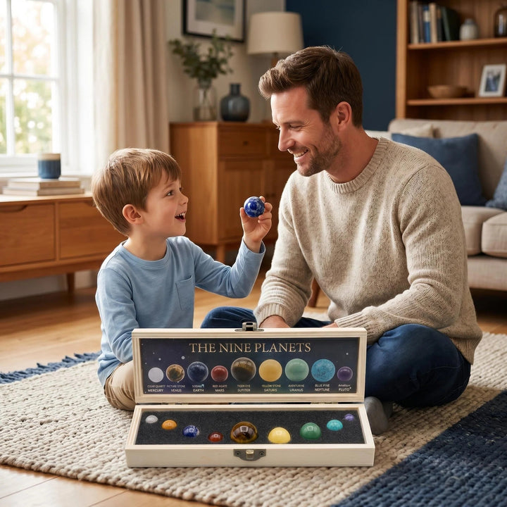 Father and son exploring the Solar System Nine Planets Crystal Set featuring colorful gemstone spheres in a wooden box.