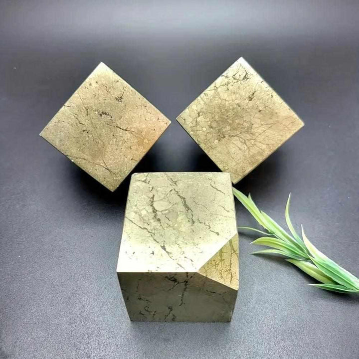 Sparkling natural Pyrite leaning cube specimen with metallic gold luster, perfect for Solar Plexus chakra grounding.