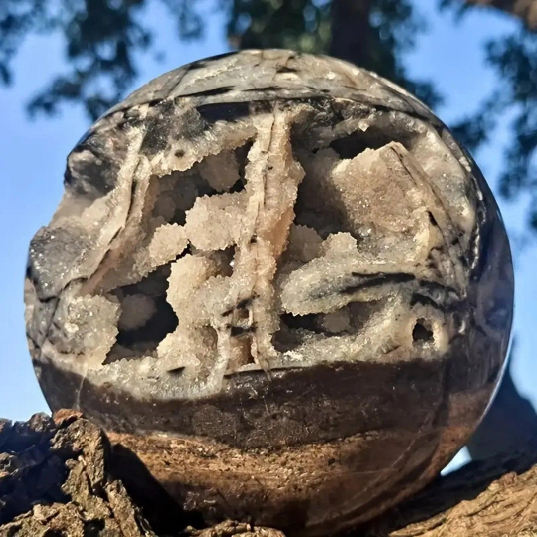 Unique gray and black Sphalerite crystal sphere with intricate patterns and sparkling druzy, promoting grounding.