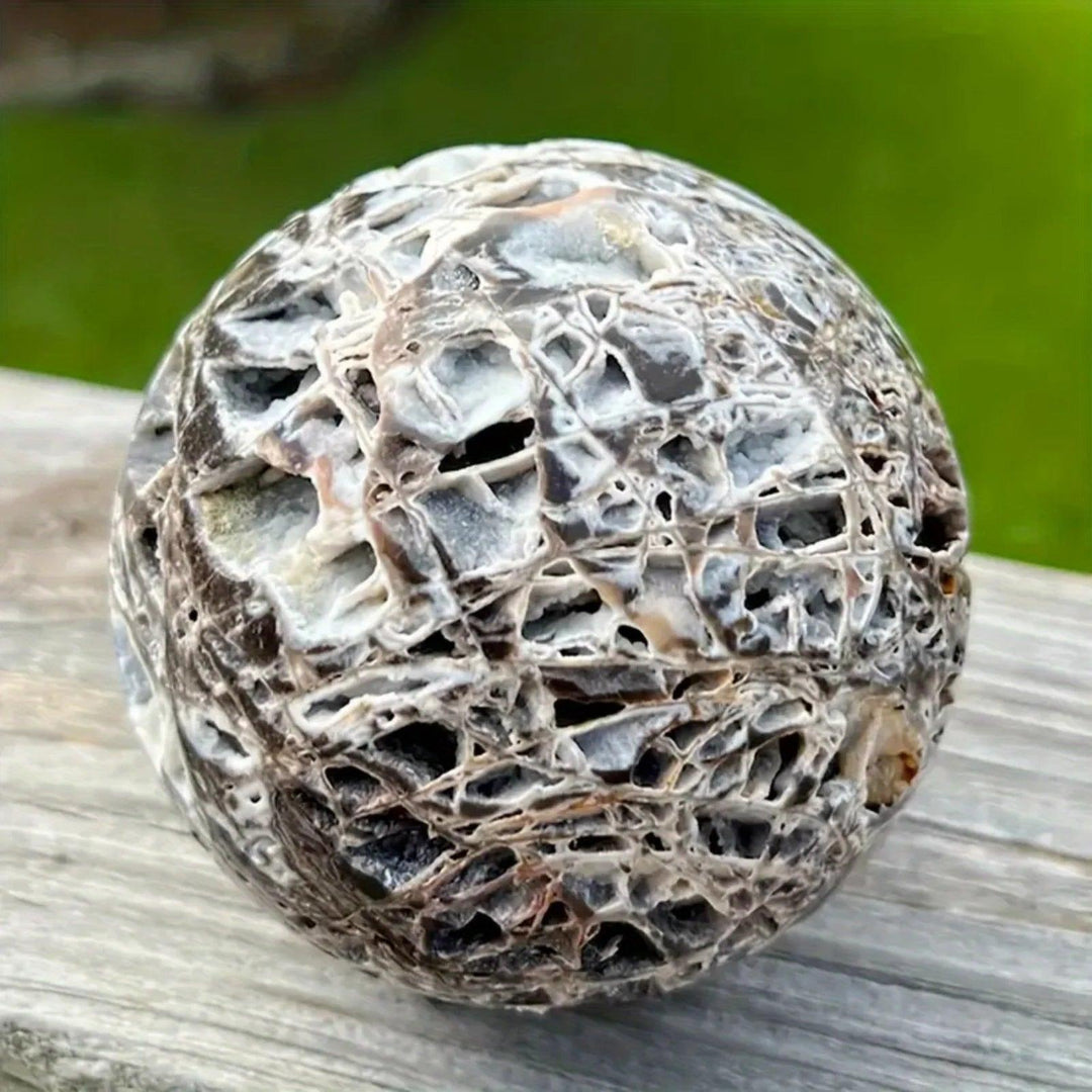 Unique gray and black Sphalerite crystal sphere with intricate patterns, perfect for jewelry making or display.