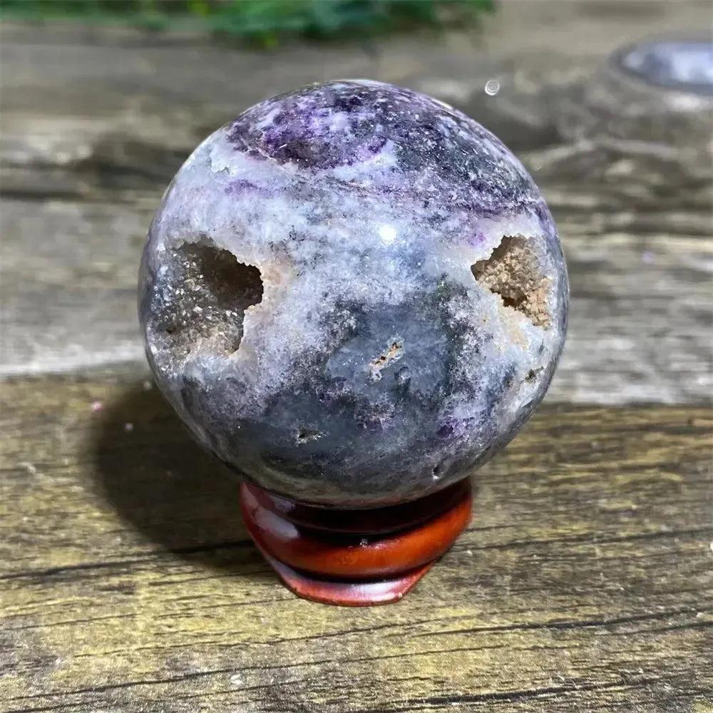 Polished Sphalerite Sphere with Stand, showcasing metallic luster, rich amber to brown tones, and natural variations.